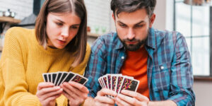 Couples playing cards