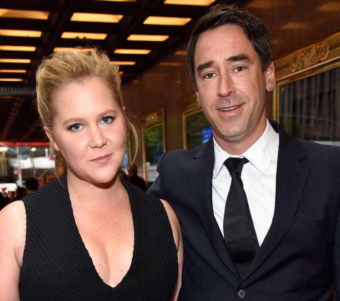 Amy Schumer and Chris Fischer